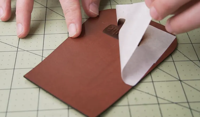 removing the masking tape from laser engraved leather